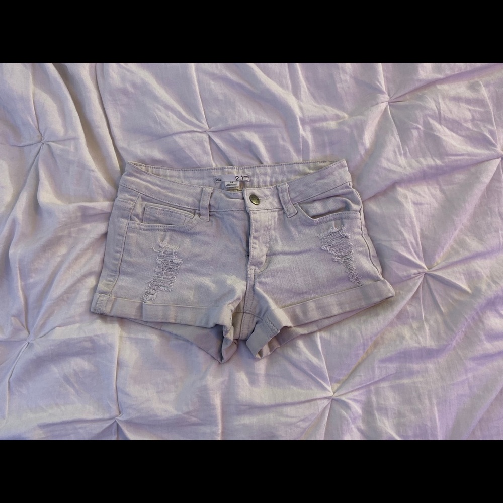 White ripped shorts